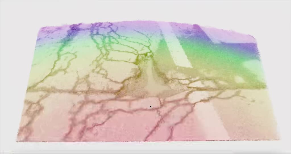 The same road surface resolving into a depth-shaded point cloud that turns to show the pothole in relief